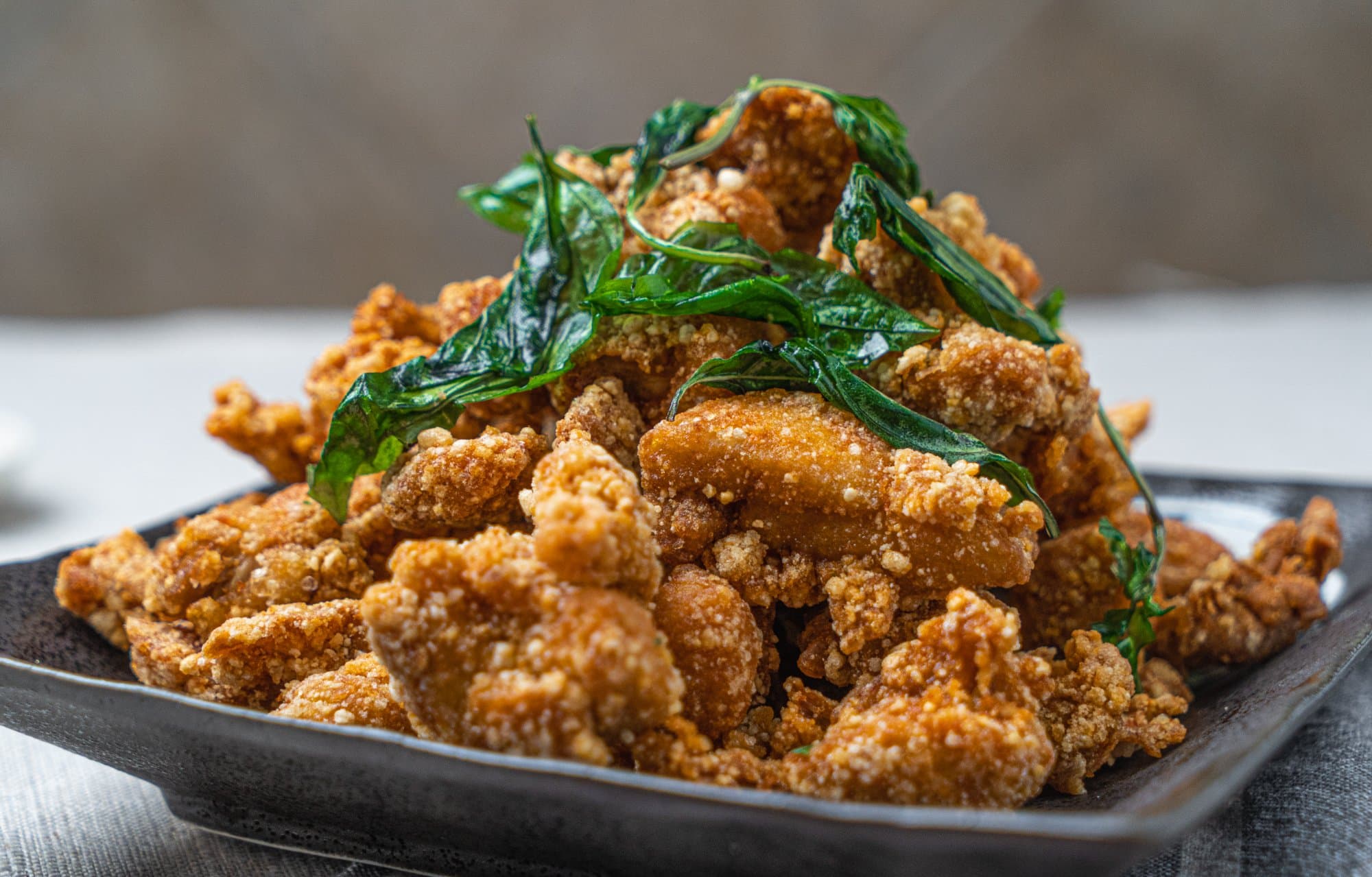 Popcorn Chicken - Bite-sized crispy chicken pieces seasoned with salt and spices. A popular snack | Appetizer
